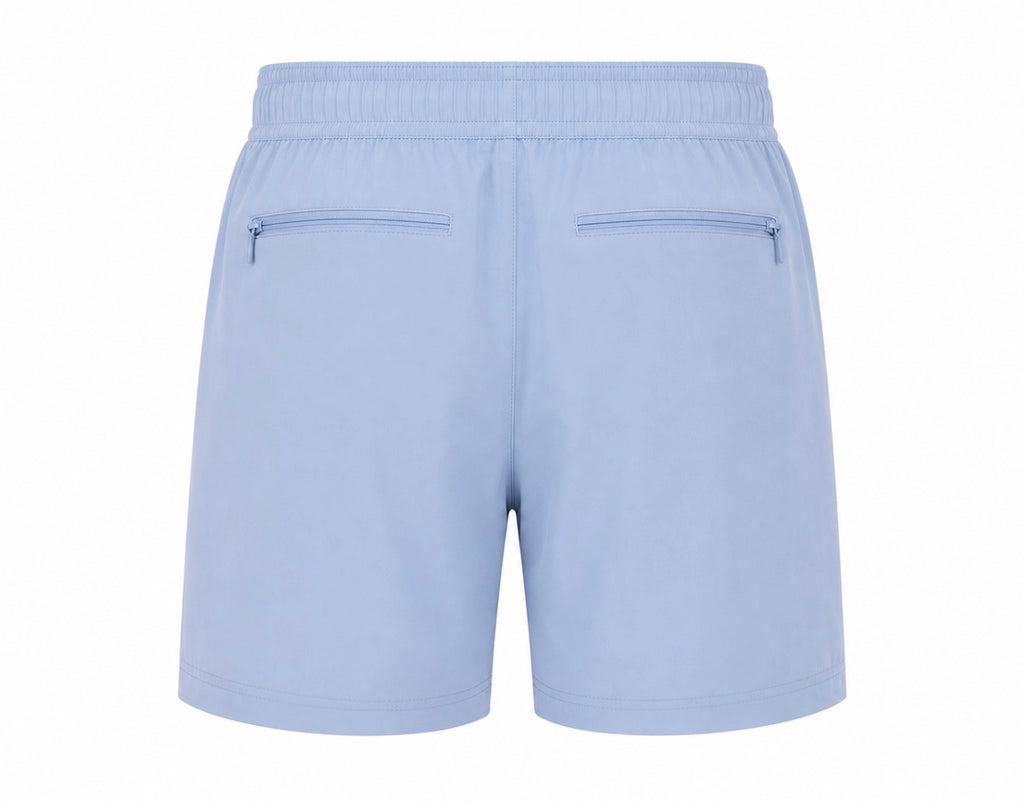 Light blue athletic shorts shown from the back, featuring an elastic waistband and two zippered pockets.