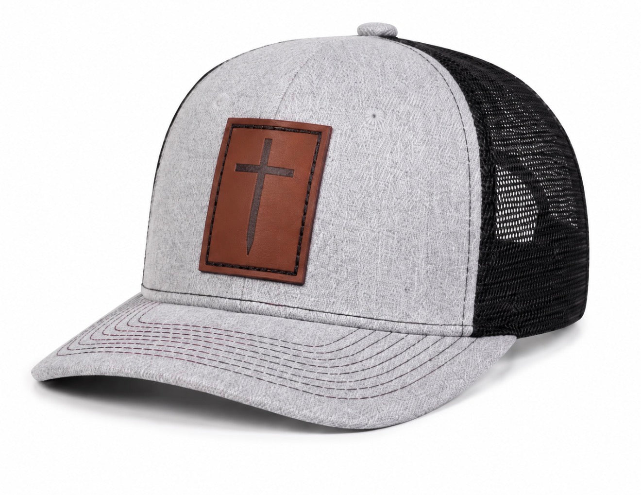 Heather gray and black trucker hat with brown leather cross patch, side view – ETRNL Apparel Cornerstone Hat"