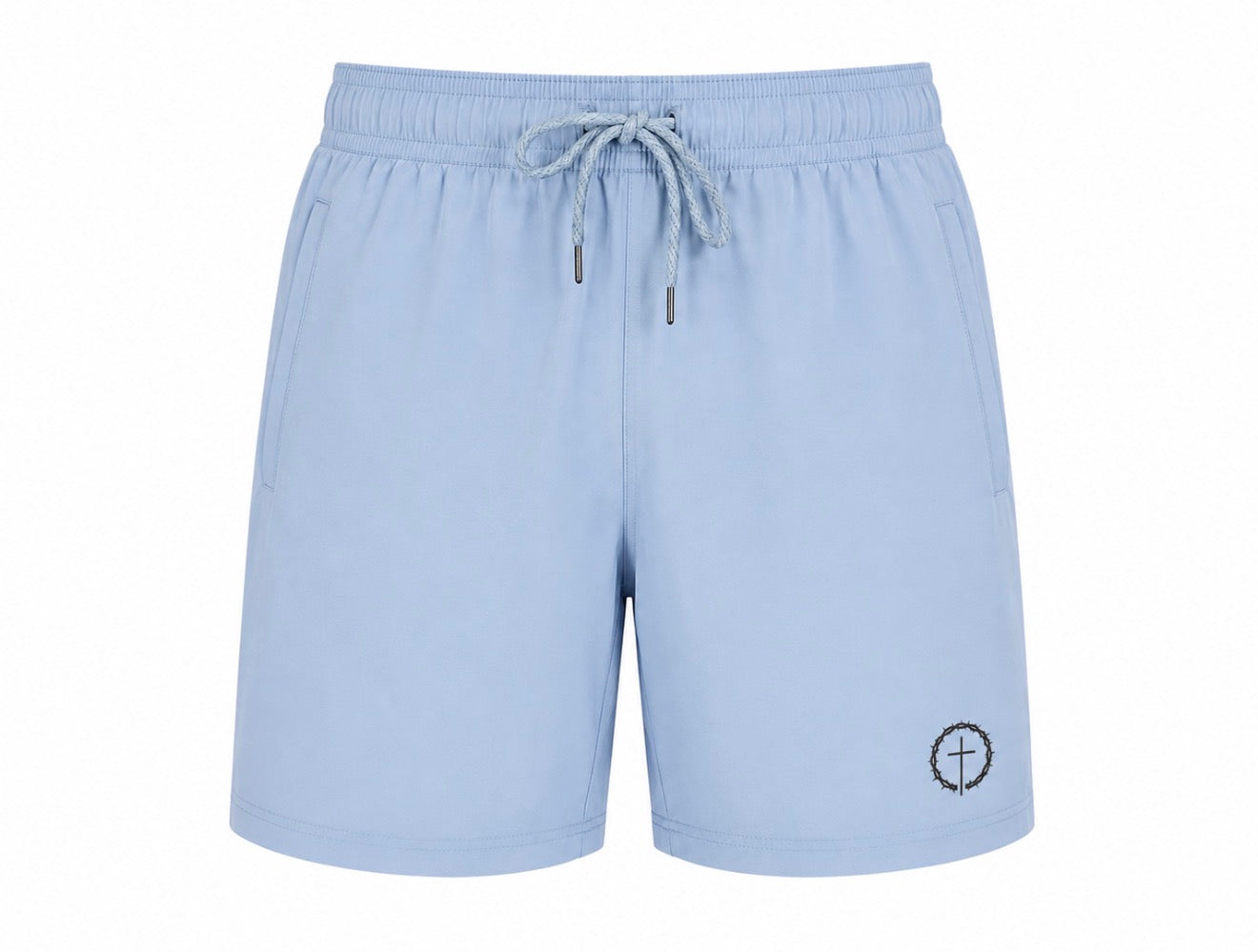 Light blue athletic shorts with an elastic drawstring waistband and a small circular cross logo on the lower left leg, shown against a plain white background.