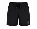 Black dry-fit shorts with adjustable drawstring, side zipper pockets, and cross with crown of thorns graphic on left leg.