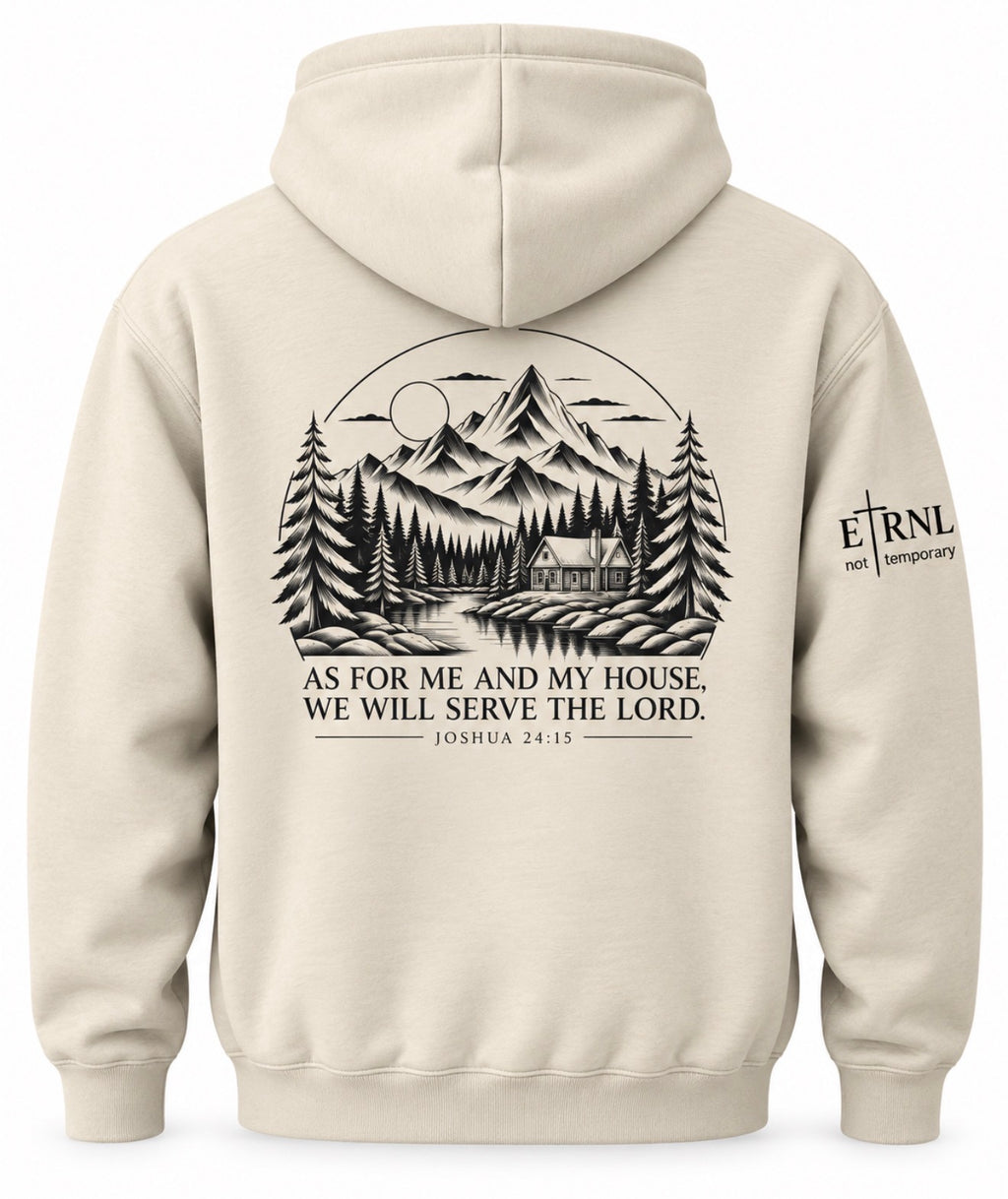 Back view of a beige hoodie featuring a large black graphic of a mountain cabin scene with the text 'AS FOR ME AND MY HOUSE, WE WILL SERVE THE LORD. JOSHUA 24:15' and a smaller 'ETRNL not temporary' logo on the left sleeve.
